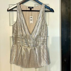 Peplum metallic sleeveless blouse